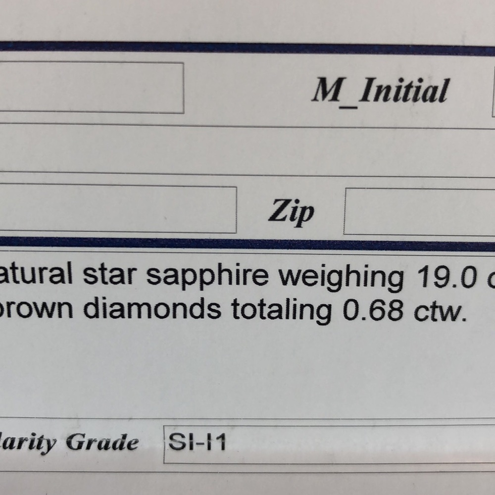 19 ct Star Sapphire surrounded by Diamonds in gold - Picture 13 of 15